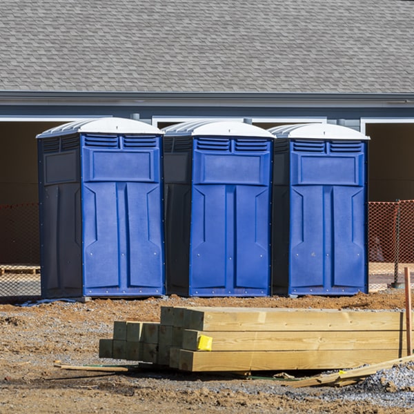 what is the cost difference between standard and deluxe portable toilet rentals in Athol Springs